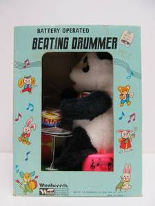 lot 104 image: Vintage Woolworth Battery Operated Panda Beating Drummer Original Box
