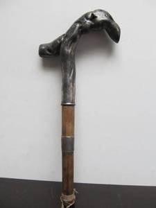 lot 279 image: Interesting Antique Folk art Cane or Walking Stick Top with Abstract Silver Handle
