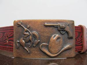 lot 282 image: Very Cool Vintage 1950s Leather Childs Western Leather Belt wCopper Cowboy Buckle