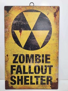 lot 305 image: 2 Metal Zombie Decor Signs