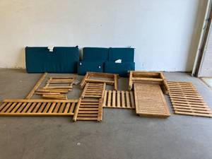 lot 44 image: Noble House Newbury Teak Brown 4-Piece Wood Patio Conversation Set with Dark Teal Cushions