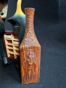 lot 71 image: Cork Holder and Vintage Leather Covered Wine Bottle