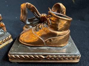 lot 82 image: Vintage Bronze Baby Shoe Bookends
