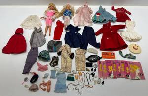 lot 32 image: Vintage Barbies, Barbie Clothes And More