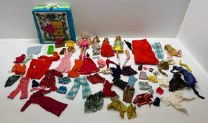 lot 33 image: Vintage Barbies, Carrying Case,  Barbie Clothes And More