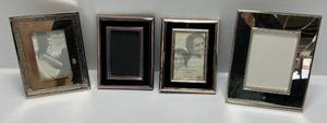 lot 40 image: Group Of Misc. Sizes Of Silver Plated Frames Including Reed And Barton