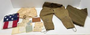 lot 92 image: Group Of Misc. Military Items Including  WWI US AEF Army Tan Cotton Breeches, Blanket, Ration Book And More