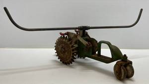 lot 173 image: Vintage National Mfg. Co. Cast Iron Walking Lawn Tractor Sprinkler