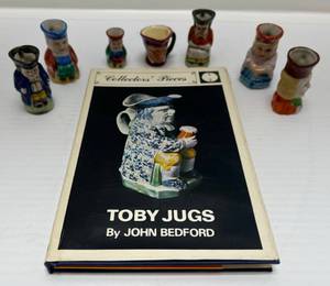 lot 178 image: Miniature Toby Mugs With Book, Including Royal Doulton, Made In Occupied Japan And More