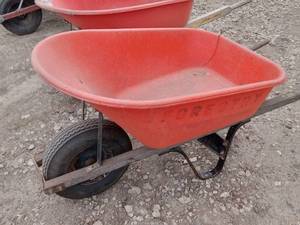 lot 28 image: (2) Molded-Plastic Wheelbarrows