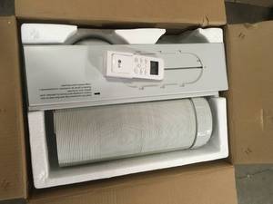 10,200 BTU (6,500 BTU, DOE) Portable Air Conditioner, 115-Volt with Dehumidifier Function and LCD Remote in White by LG Electronics Customer Returns See Pictures