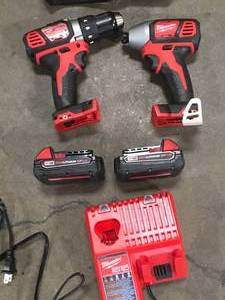 Milwaukee  M18 18V Lithium-Ion Cordless Drill DriverImpact Driver Combo Kit (2-Tool) W Two 1.5Ah Batteries, Charger Tool Bag Customer Returns See Pictures