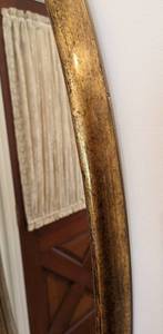 lot 39 image: Gold Colored Oval Wall Mirror