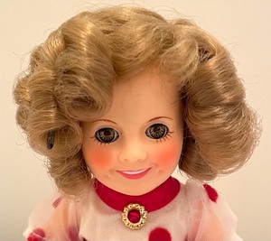 lot 116 image: Shirley Temple Doll by Ideal and Vintage Hazel Atlas Cobalt Blue Petite Pitcher