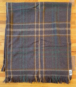 lot 130 image: Four Throw Blankets by Faribo Woolens and Amana Woolen Mills
