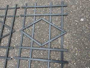lot 168 image: Two Metal Trellises And A Shephards Hook Plant Hanger
