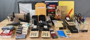 lot 147 image: Office Supplies Scissors, Pencil Cups, Envelopes, Canon Adding Machines, Staplers and Staples, Pencil Sharpener, Gorilla Glue, and More R