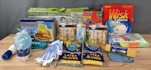 lot 145 image: Cleaning Supplies  Wisk Tablets, Shameze, Black & Decker Scum Buster, Handy Scrubber, Latex Gloves, Polishing Cloths, Febreze Plug In Refills, and More  R
