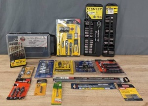 lot 60 image: Assortment of Tools Double Sided Organizer, Drill Bit Set, Star Point Drive Set, Stanley 4 in 1 Socket Driver, Socket Wrench, Socket Adapter, 6 Circle Cutter, Hack Saw Blades, Oregon Replacement Stones and More R
