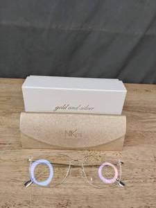 lot 213A image: NEW Gold and Silver NIK03 Glasses With Display Lenses L