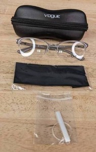 lot 140 image: New Vogue Eyeglass Frames with Display Lenses, Case and Cleaning Cloth  L
