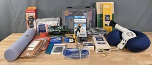 lot 135 image: Health and Wellness Items First Aid Kit, Knee Stabilizer, Elbow and Wrist Supports, Compression Socks and Much More R