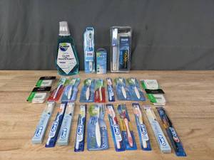 lot 80 image: An Assortment of NEW Oral B, Colgate, Crest, QLabs, Reach, Equate Dental Accessories R