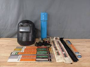 lot 94 image: Welding Items Including Welding Hood, Welding Rods, Goggles and More  R