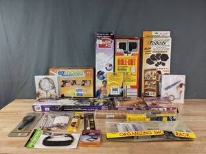 lot 161 image: Assortment of Home and Moving Items Stopwatch, FurnitureWood Touch-up Markers, Organizing Shower Rack, Furniture Mover Disks and Wheels, Furniture Fix Cushion Supports, and more R