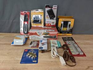 lot 177 image: Assortment of New Electrical Home Items - GE 6-Outlet Wall Tap, Digital Splitters, Philips Audio Y Adapter, Inland USB Ports, Extension Cords, Cable Organizers, RCA Universal Remote, Magnavox DigitalAnalog Converter, and More R