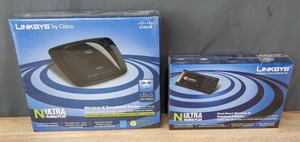 lot 170 image: NEW Linksys by Cisco Wireless-N Broadband Router and NEW Linksys by Cisco Dual Band Wireless-N Notebook Adapter  R
