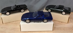 lot 46 image: Collection of 3 Vintage ERTL Toy Corvettes in Boxes  J