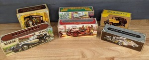 lot 106B image: (6) Vintage Avon Decorative Bottle After Shave Silver Duesenberg, Stutz Bearcat 1914, Bugatti 27, Country Vendor, Cable Car and 1926 Checker Cab J