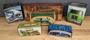 lot 105B image: (6) Vintage Avon Decorative Bottle After Shave Volkswagen, Army Jeep, 1876 Centennial Express, Dueling Pistol 1760, Highway King Everest and Big Rig J