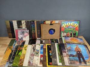lot 35A image: A Collection of Vinyl Records Including Elton John, The Charlie Daniels Band, Rod Stewart, Eric Clapton and More  J