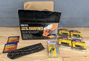 lot 264A image: Electric Chain Saw Sharpener, (2) Electric Chain Saw Sharpener Replacement Grinding Disc, (3) 14 Saw Chain, 10 Saw Chain, Diamond Chain Saw Sharpening Kit and More R