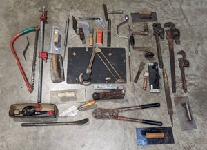 lot 216A image: Assortment of Hand Tools Adjustable Wrenches, Wire Cutter, Bow Saw, Trowels, File Rasp and More R