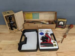 lot 207 image: Tasco 900X Zoom Microscope in Case, Ampere Meter, Hydrometer, Adams 100-500x Microscope in Wooden Box, and More Lab Supplies  R