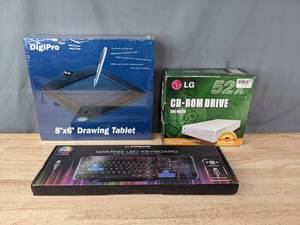 lot 231 image: A Trio of Technology a NEW DigiPro Tablet, L.G. CD-Rom, and NEW Xtreme Tech Gaming Keyboard R