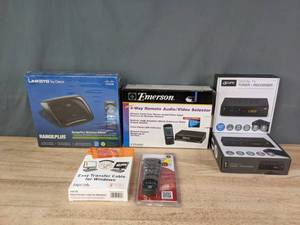 lot 309A image: New Linksys RangePlus Wireless Router, GE Universal Remote, LapLink Easy Transfer Cable, Emerson 4-Way Remote AudioVideo Selector, (2) GPX Digital TV Tuner and Recorder R