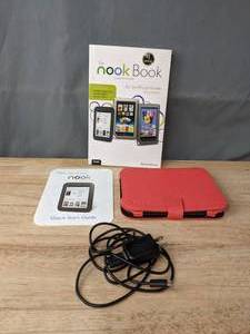 lot 28 image: Barnes and Noble Nook with Charger, Case, and Guide R