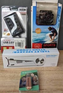 lot 242 image: NEW Computer Accessories  Album Saver Storage, Tablet Speaker Stand Combo, Waterproof HD 1080P Sports Cam, 10 Port USB 2.0 Hub  R