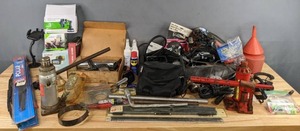 lot 254 image: Automotive Accessories  Automated Tire Inflator, Wiper Blades, Cell Phone Holders, Sears Inductive Timing Light, Portable Car Camcorder, Windshield Cleaner, WD-40, 4 Ton Hydraulic Jack, and Much More  R