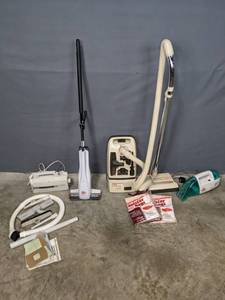 lot 300 image: Vintage Vacuums Including Oreck XL, Dirt Devil, Kenmore 3.9 and Bissell Spot Lifter  R