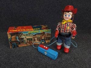 lot 419 image: 1950s  Marshal Wild Bill Remote Control Tin Toy with Original Box - WORKS, SEE VIDEO