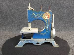 lot 567 image: 1940s Hand Crank Little Mother Tin Sewing Machine
