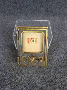 lot 599 image: Antique Brass Mailbox Door w Glass 101 Window
