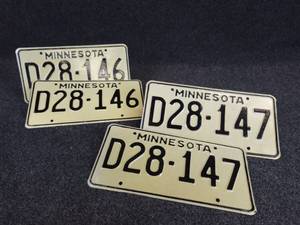 lot 538 image: (2) Sequential Pairs of Vintage Matched Minnesota Dealer License Plates