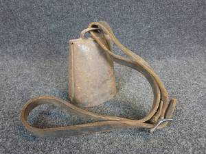 lot 627 image: Antique Cowbell w Leather Strap
