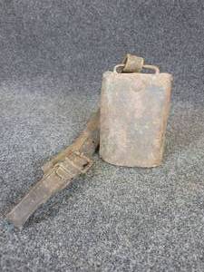 lot 634 image: Antique Cowbell w Leather Strap